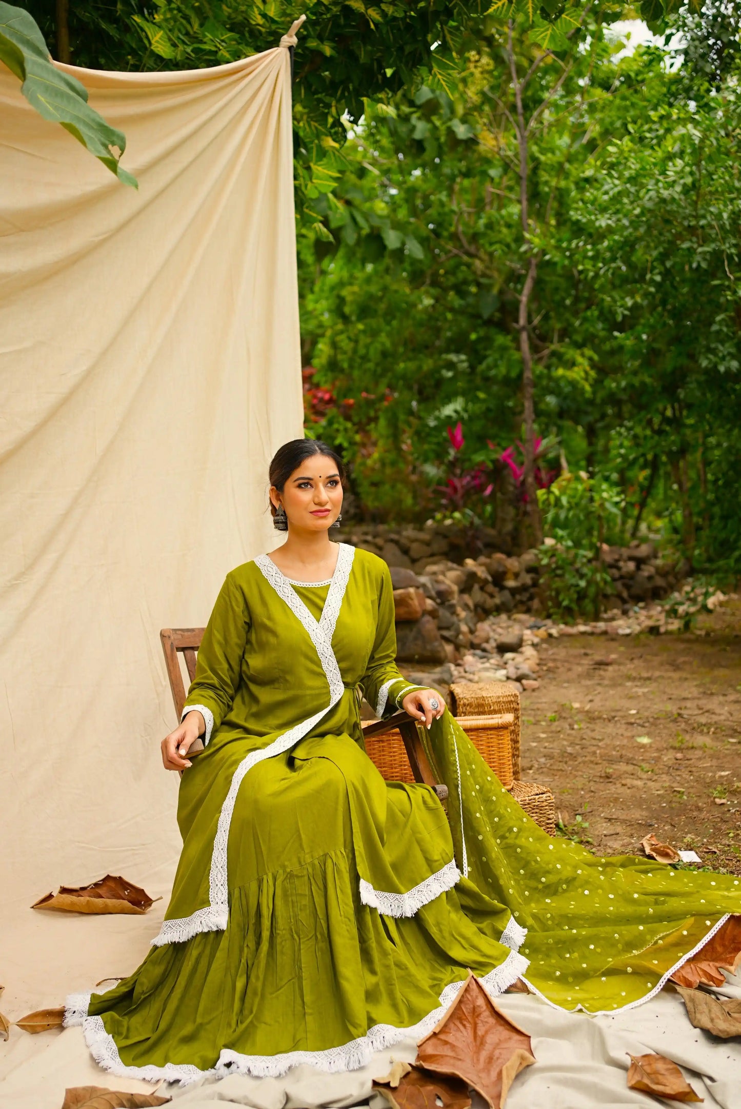 Green Anghrakha set with dupatta.