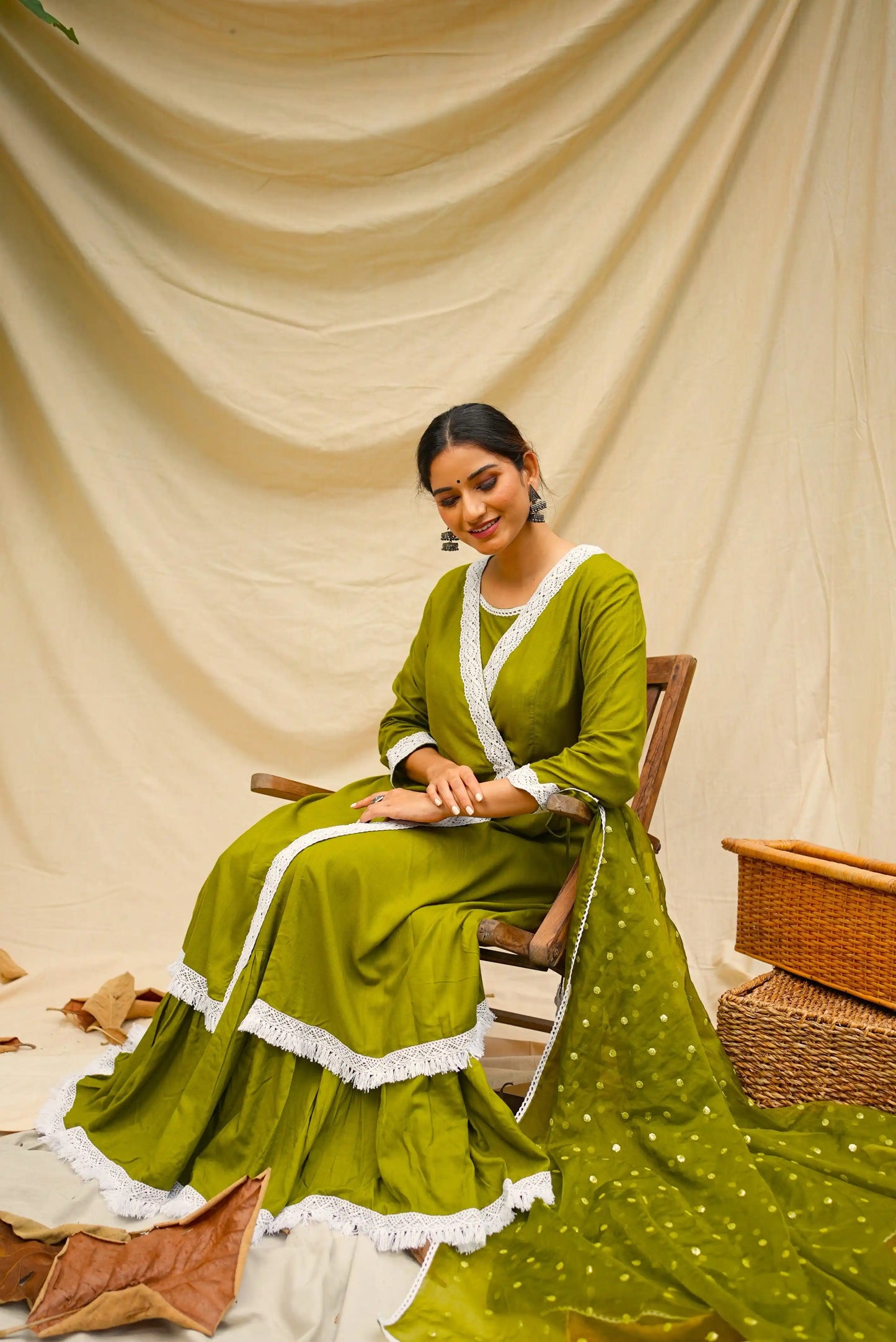 Green Anghrakha set with dupatta.