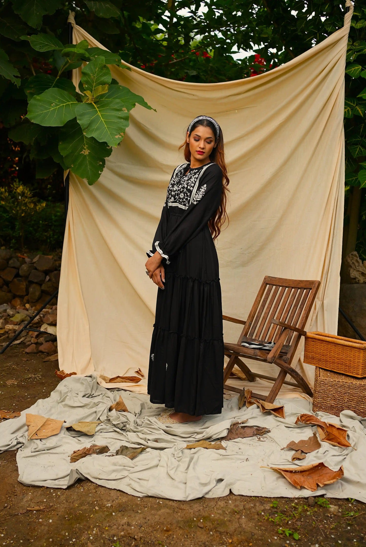 Ankle length embroidered Black tiered dress.
