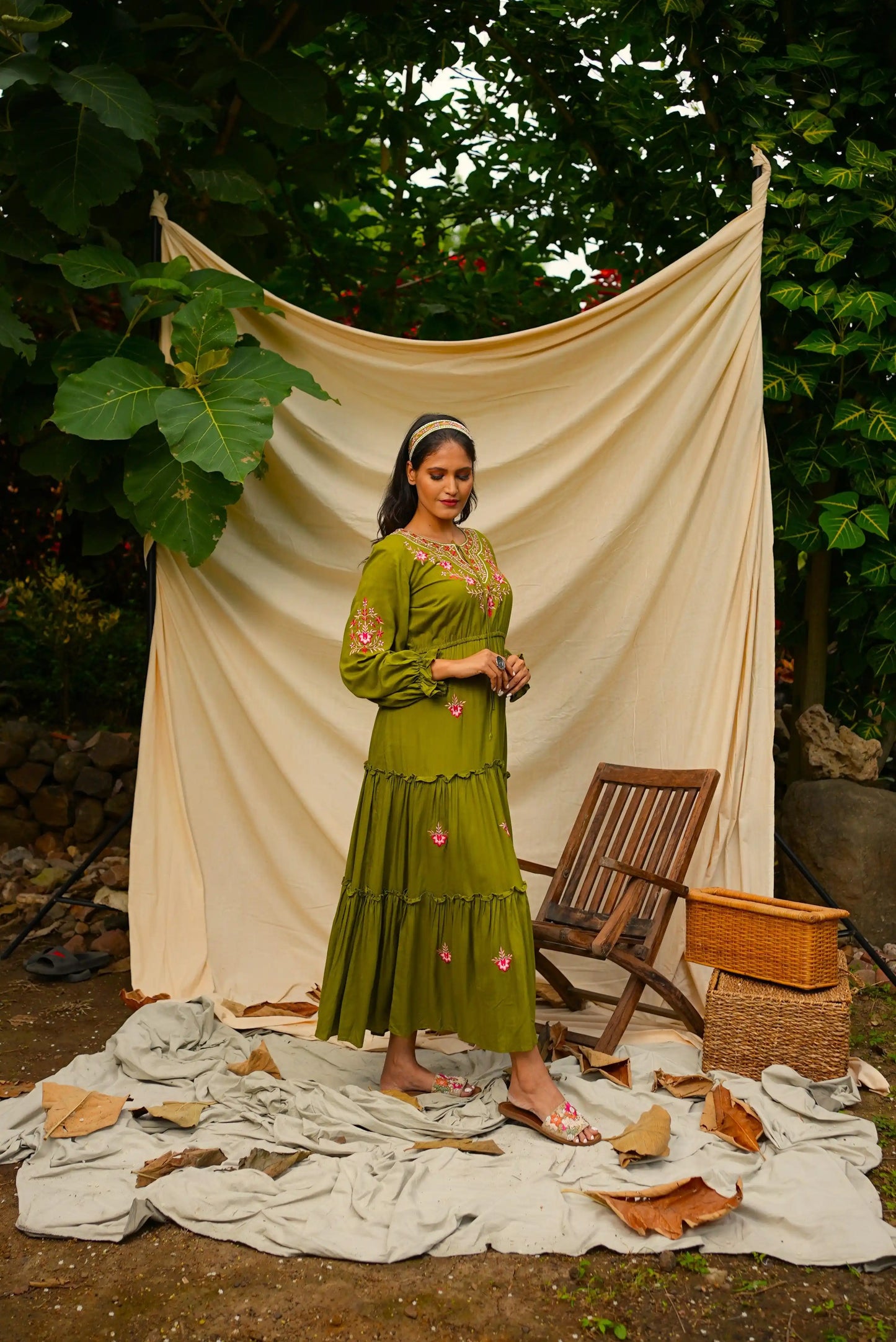 Ankle length embroidered Green tiered dress.