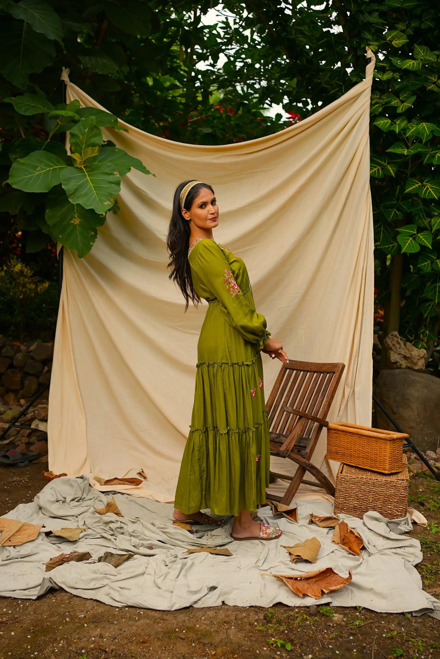 Ankle length embroidered Green tiered dress.