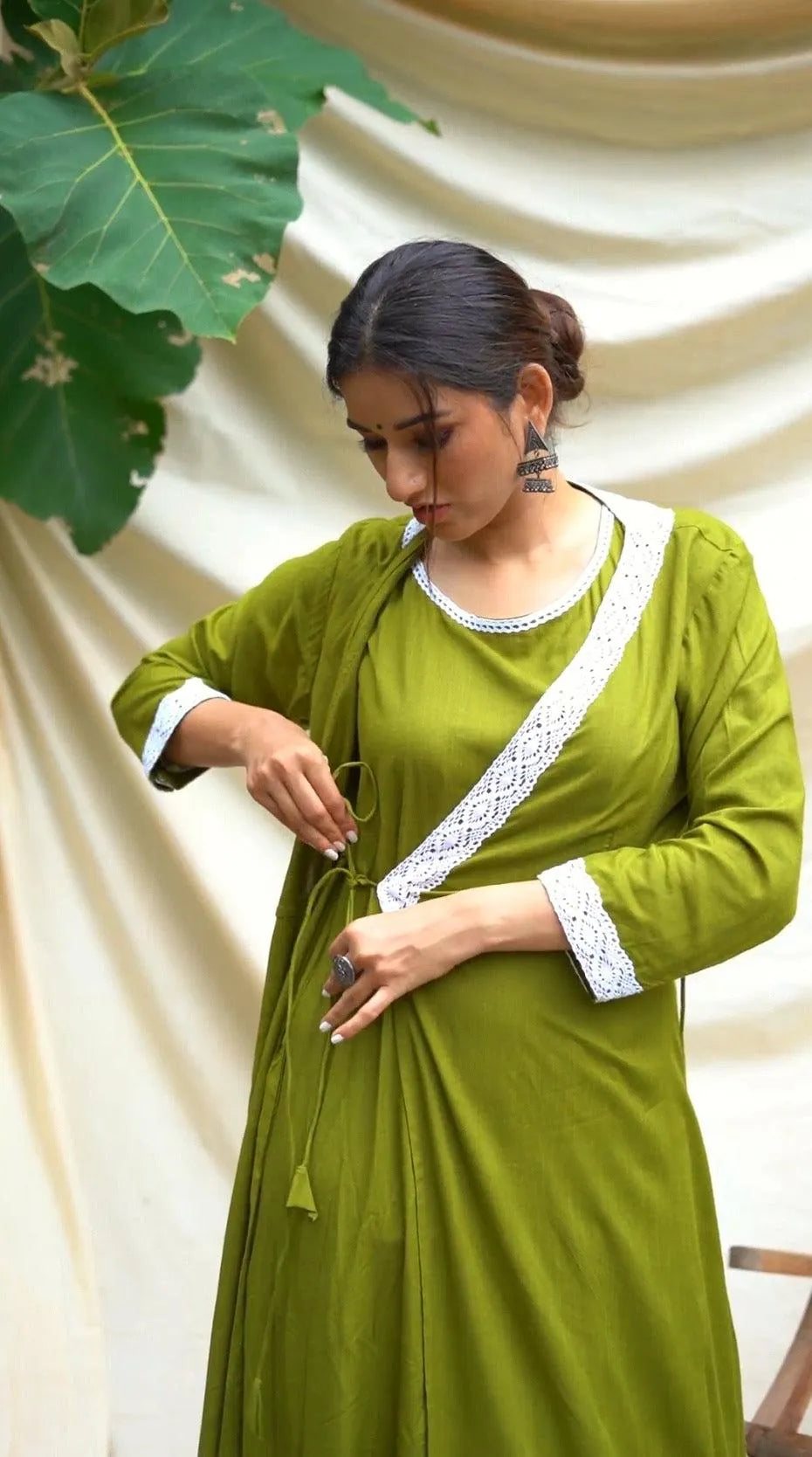 Green Anghrakha set with dupatta.