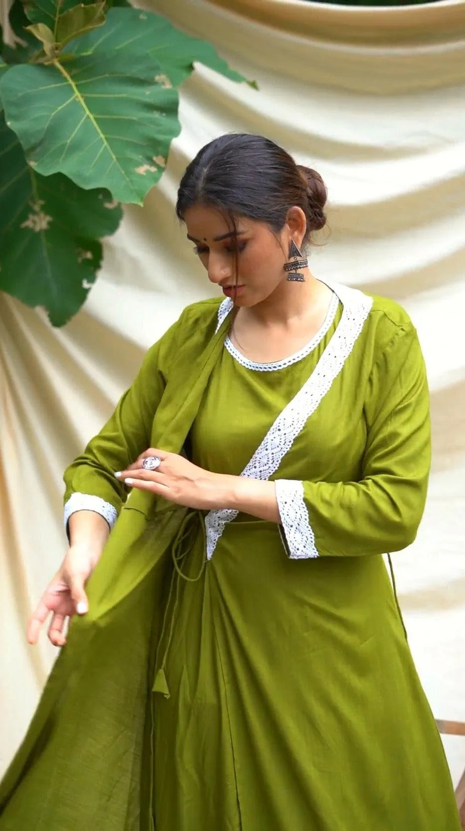 Green Anghrakha set with dupatta.