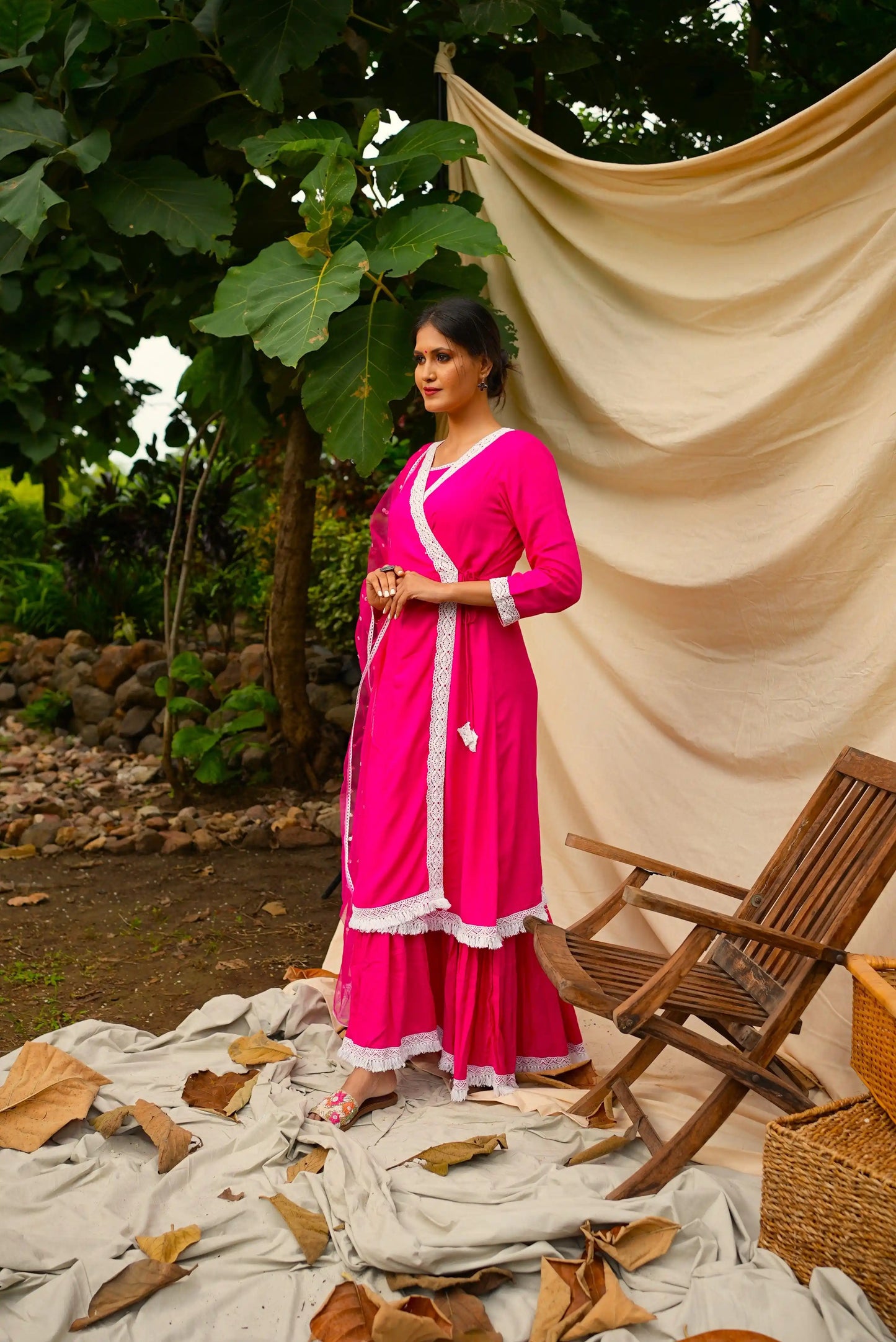 Pink Anghrakha set with dupatta.