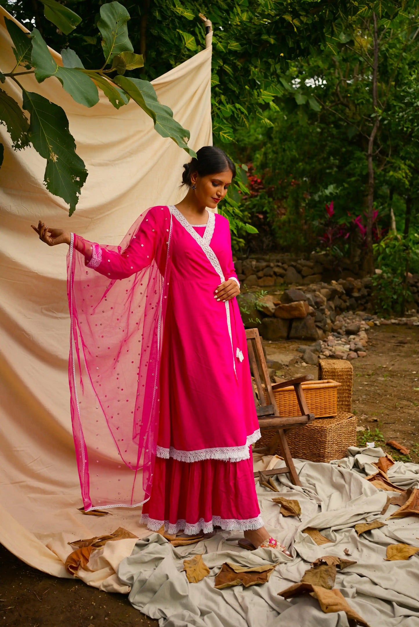 Pink Anghrakha set with dupatta.