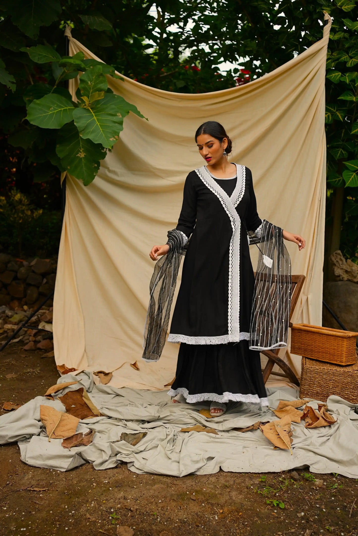 Black Anghrakha set with dupatta.