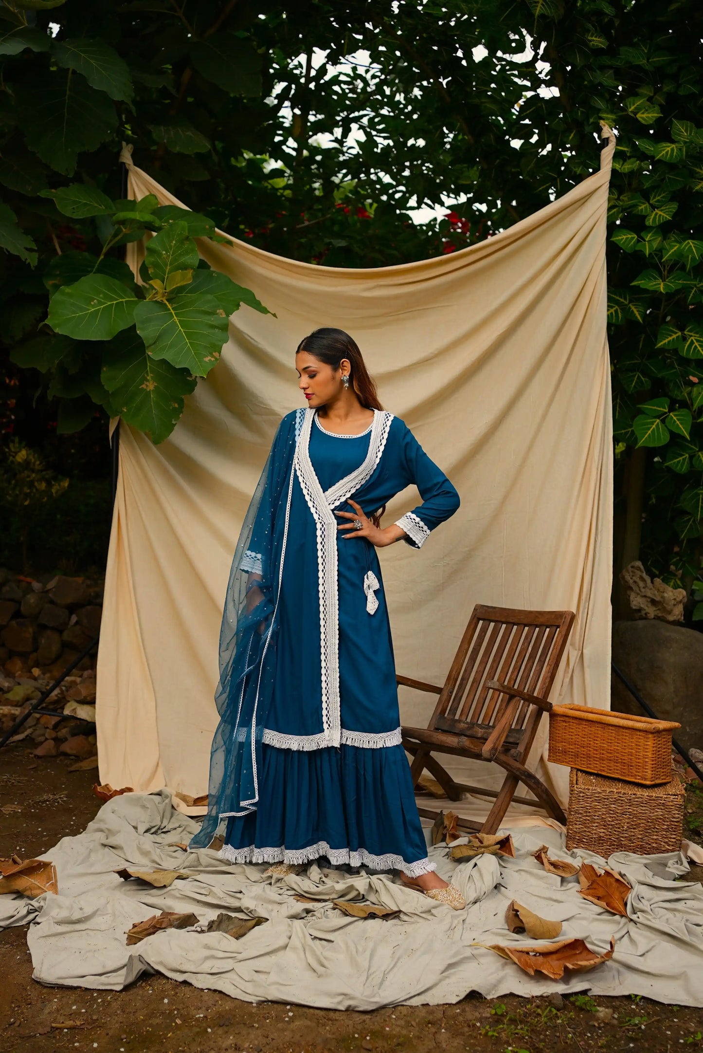 Blue Anghrakha set with dupatta.