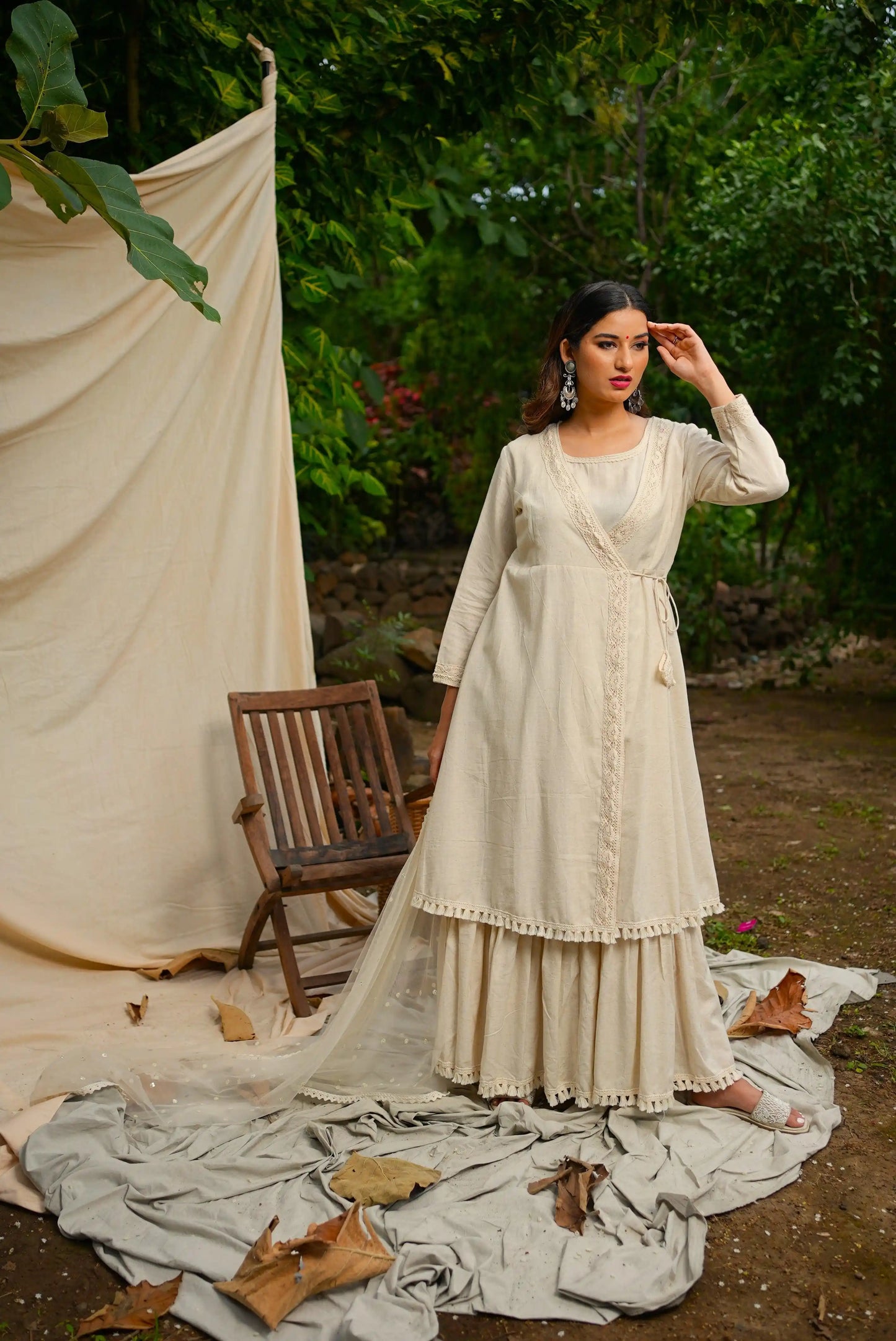 White Anghrakha set with dupatta.